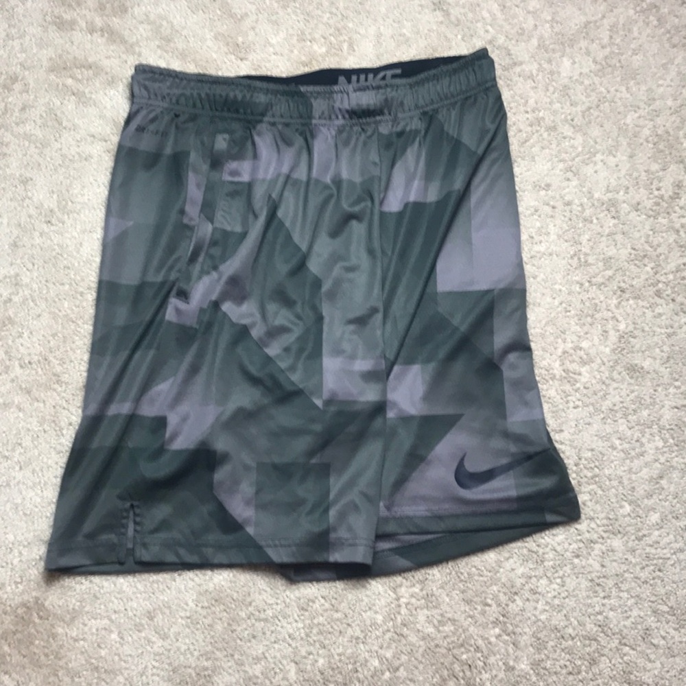 Dark Green Nike shorts with pattern